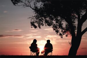 two people enjoying sunet